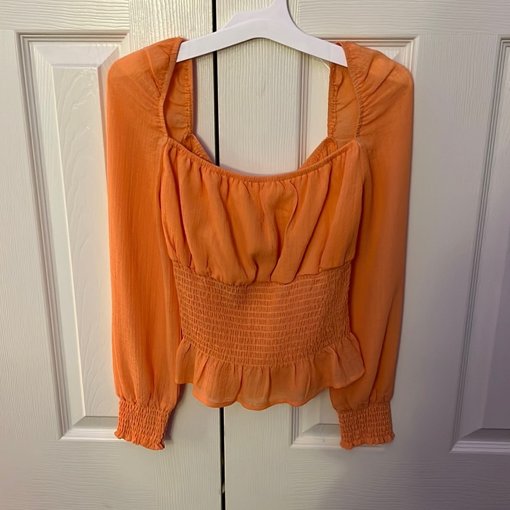 slightly cropped cute top, from Favlux